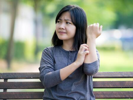 a-woman-scratching-because-of-itchy-forearms.jpg